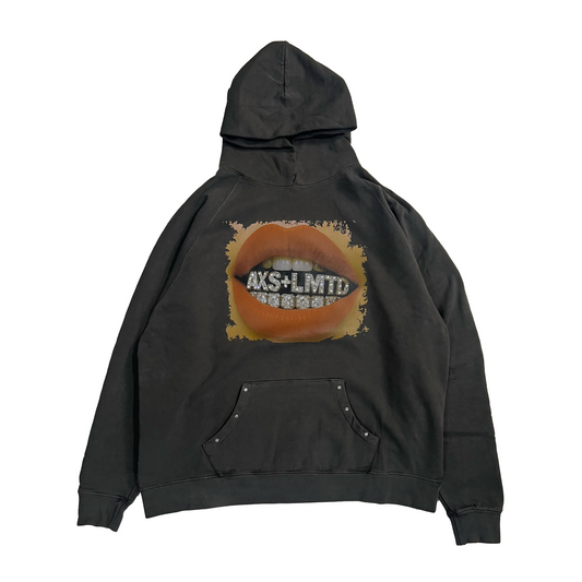 Black hoodie with a graphic design on the back against a white background