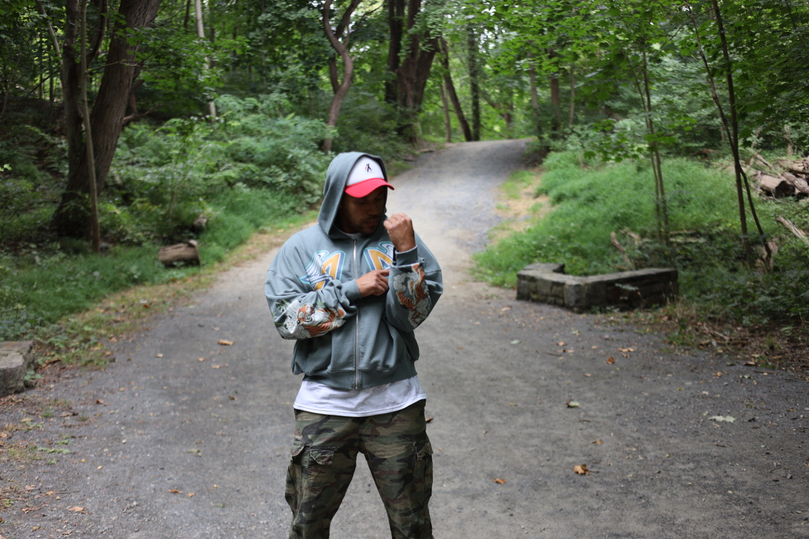 Heavyweight Drop Shoulder Full Zip Hoodie – “Tiger & Angels” Graphic Streetwear worn outdoors on a forest path.